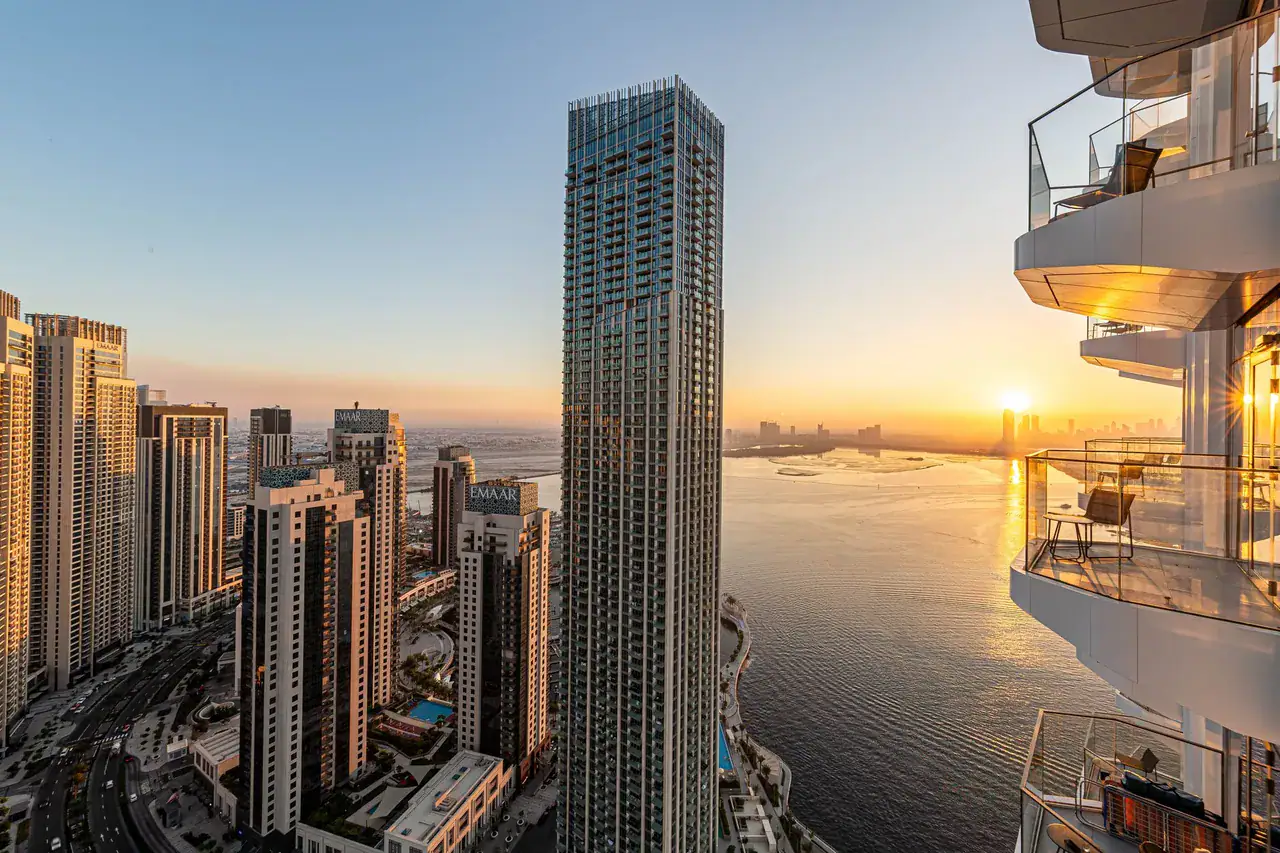 Balconies of residential towers by the sea in Dubai Marina, the kind of apartments owners let to guests as holiday homes